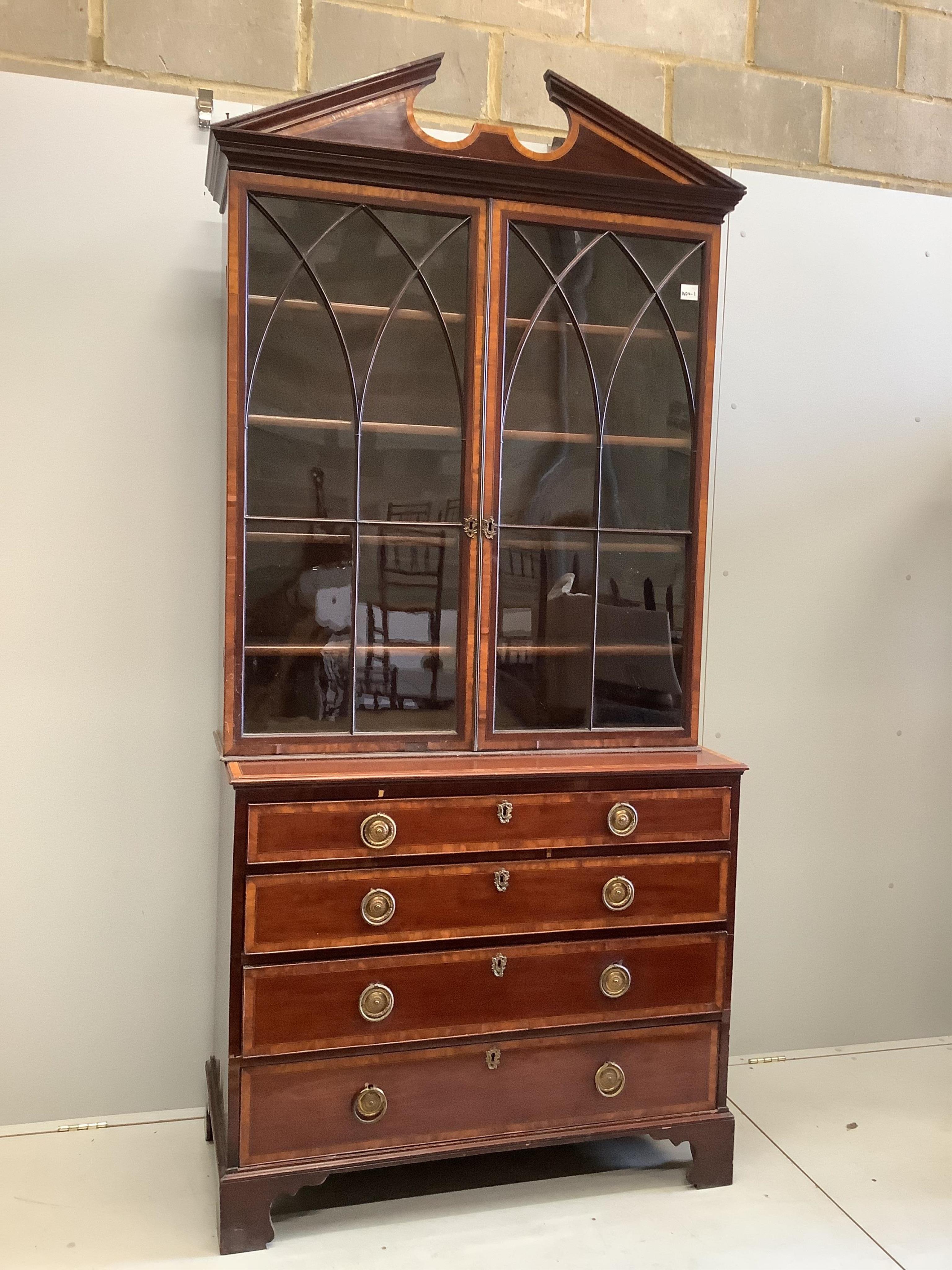 A George III and later satinwood banded mahogany secretaire chest, width 109cm, depth 51cm, height 215cm. Condition - fair